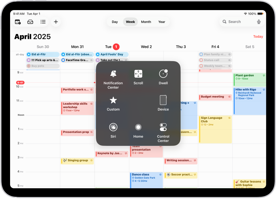 AssistiveTouch ಮೆನು ಕಾಣಿಸುವ iPad, ನೋಟಿಫಿಕೇಷನ್ ಸೆಂಟರ್, ಸಾಧನ, ಕಂಟ್ರೋಲ್ ಸೆಂಟರ್, ಹೋಮ್, Siri ಮತ್ತು ಕಸ್ಟಮ್ಗಾಗಿ ಕಂಟ್ರೋಲ್ಗಳನ್ನು ತೋರಿಸುತ್ತಿದೆ.