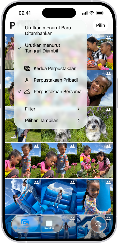 Perpustakaan Foto Bersama iCloud di app Foto. Tombol Perpustakaan Bersama di pojok kiri bawah dipilih, dan Perpustakaan Bersama dipilih di daftar opsi perpustakaan. Semua foto yang ditampilkan di perpustakaan memiliki tanda perpustakaan bersama di pojok kanan atas.