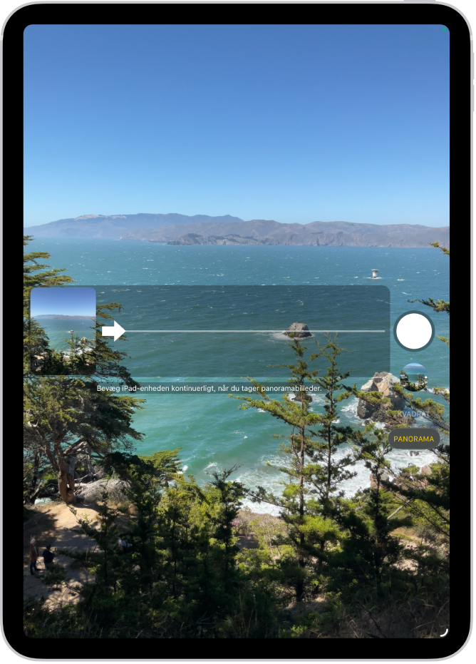 Kamera i panoramafunktion. En pil til venstre for centrum peger mod højre for at vise retningen for panoramaet.
