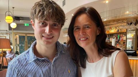 A mum and son in a restaurant