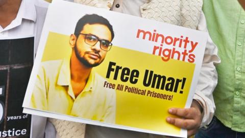 Protesters gather in Delhi's Jawaharlal Nehru University in September 2025 to demand the release of Umar Khalid and other activists who were in jail in connection with the 2020 Delhi riots