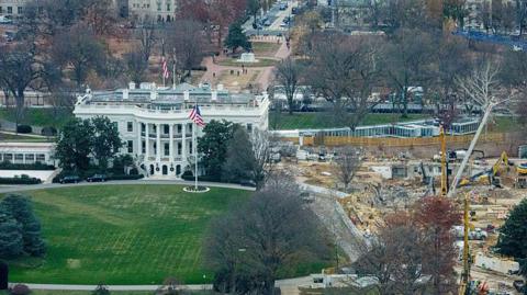 The White House, seen with the historic East Wing demolished nearby