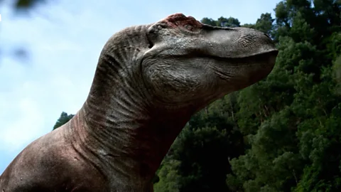 Watch a T. rex ambush a young triceratops