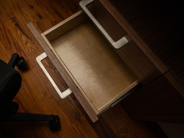 Image may contain Drawer Furniture Wood Cabinet and Chair