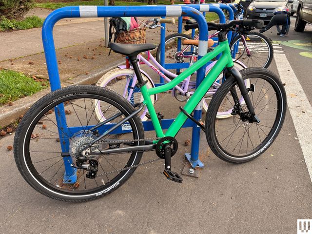 Image may contain Machine Wheel Bicycle Transportation Vehicle Person and Car